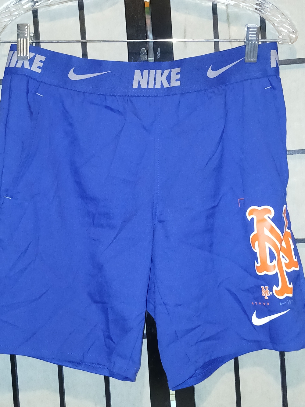 Nike Blue Athletic Shorts with Orange Team Logo